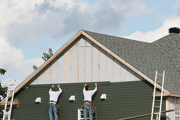Professional Siding Replacement technician working in Freeport, TX